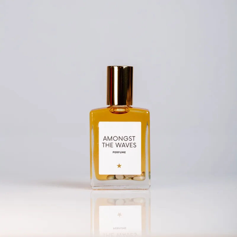 Olivine Amongst The Waves perfume oil with its gold cap
